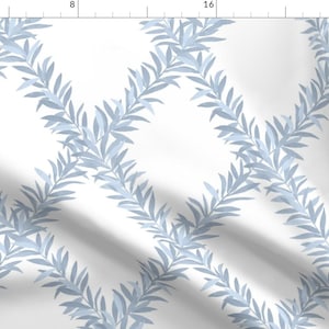 May include: A seamless pattern featuring a repeating design of light blue leafy branches on a white background.