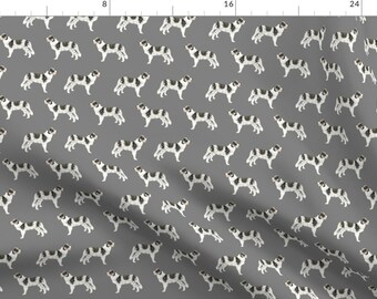 May include: A seamless pattern featuring black and white dogs on a gray background. The dogs are all facing the same direction and are in a variety of poses.