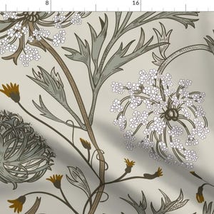 May include: A seamless pattern featuring a repeating design of stylised flowers in shades of brown, grey, and white on a light beige background.
