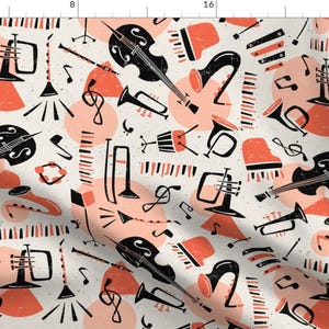 May include: A seamless pattern featuring a variety of musical instruments in black and white silhouettes on a white background. The instruments include a trumpet, trombone, saxophone, violin, and a drum. The pattern is accented with coral pink circles and musical notes.