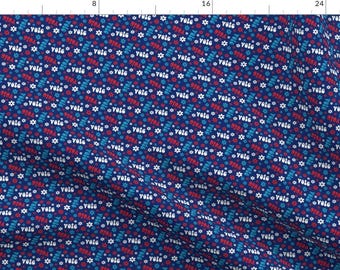 May include: A navy blue fabric with a repeating pattern of white stars, red and blue "Vote" text, and red and blue stylized flowers.