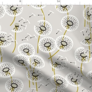 May include: A seamless pattern featuring white dandelion seed heads with black centres and gold stems on a light grey background.