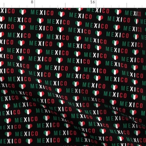 May include: A black fabric with a repeating pattern of white "MEXICO" text and red, white, and green hearts. The hearts are stylized to look like the Mexican flag.