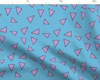 May include: A seamless pattern featuring a repeating design of light purple triangles with black outlines on a light blue background.