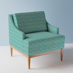 May include: An armchair upholstered in a teal fabric featuring a repeating geometric pattern of white and yellow shapes. The chair has a square backrest, integrated armrests, and a seat cushion, all supported by four tapered light wood legs.
