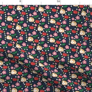 May include: A seamless pattern featuring a repeating design of cartoon guinea pigs, red tomatoes, pink flowers, and green leaves on a dark blue background.