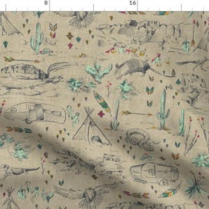 May include: A beige fabric with a repeating pattern of desert-themed illustrations. The pattern includes cacti, teepees, arrows, birds, and vintage trailers. The illustrations are in shades of brown, gray, and teal.