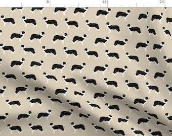 May include: A seamless pattern featuring black and white border collies on a beige background. The dogs are all facing the same direction and are in various poses.