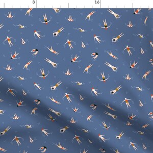 May include: A repeating pattern of swimmers on a blue background. The swimmers are all in different positions, some are on their backs, some are on their stomachs, and some are swimming on their sides. The swimmers are all wearing red swimsuits.