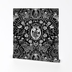 May include: Black and white wallpaper pattern featuring skeletons, flowers, and other decorative elements. The pattern is repeated throughout the wallpaper.