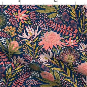 May include: A seamless pattern featuring a variety of pink and yellow flowers on a dark blue background. The flowers are stylized and have a whimsical feel. The pattern is perfect for fabric, wallpaper, or other decorative projects.