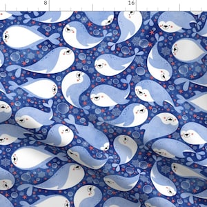 May include: A seamless pattern featuring cute cartoon seals swimming in a blue ocean with white snowflakes and red starfish. The seals are light blue and white with black eyes and pink noses.