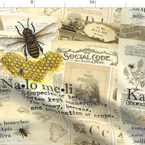 May include: Fabric with a vintage collage design featuring bees, honeycomb, and newspaper clippings. The text includes "Ka Na lo me" and "A species of bee, often kept commercially for honey, beeswax, and pollination of crops."