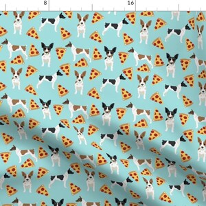 May include: A repeating pattern of black and white Rat Terrier dogs with pizza slices on a light blue background.