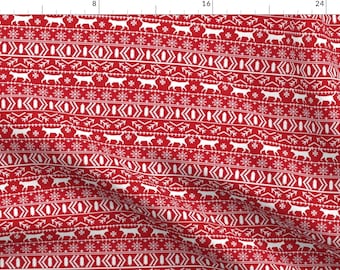 May include: Red and white patterned fabric with a repeating design of cats, snowflakes, and geometric shapes. The fabric is perfect for crafting projects, such as making holiday decorations or clothing.