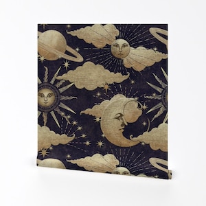 May include: A seamless pattern featuring gold celestial bodies on a dark blue background. The pattern includes suns, moons, stars, and clouds. The celestial bodies are stylised and have a vintage look.