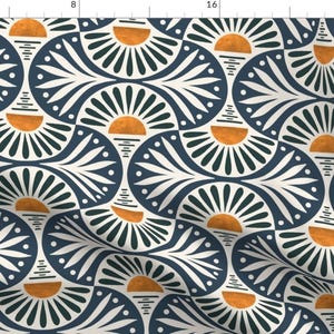 May include: A seamless pattern featuring a repeating design of stylised sunbursts in shades of orange, green, and white on a navy blue background.
