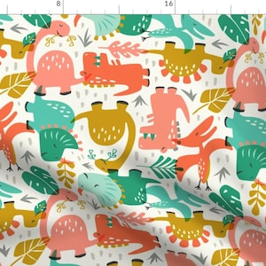 May include: A white background with a repeating pattern of colorful dinosaurs and tropical leaves. The dinosaurs are in shades of pink, orange, yellow, and green. The leaves are in shades of green and yellow.
