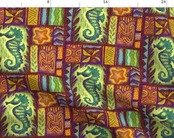 May include: A colorful fabric with a repeating pattern of seahorses, tiki masks, and geometric shapes. The background is a deep red with accents of yellow, green, blue, and purple.