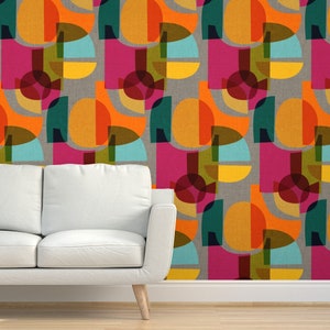 May include: A repeating pattern wallpaper featuring overlapping geometric shapes in shades of orange, yellow, teal, pink, brown, and red on a light grey background.