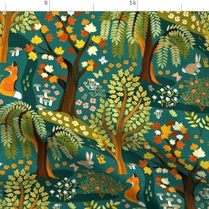 May include: A teal blue fabric with a repeating pattern of stylized trees, foxes, rabbits, and mushrooms. The trees have orange, yellow, and green leaves. The foxes are orange and white. The rabbits are white. The mushrooms are brown and white.