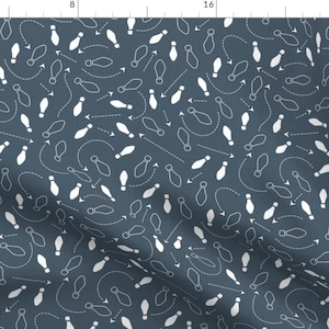 May include: A seamless pattern featuring white footprints on a dark blue background. The footprints are in a variety of positions, with some pointing to the left and some pointing to the right. The footprints are all the same size and shape, and they are evenly spaced apart.