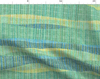 May include: Green, blue, and yellow striped fabric with a woven texture.