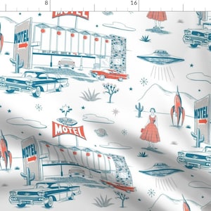 May include: White fabric with a retro design featuring motels, cars, rockets, and UFOs in teal, red, and gray. The design includes the word "MOTEL" on signs and buildings, and figures in dresses.