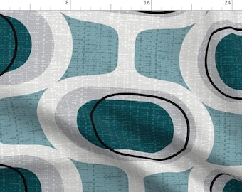 May include: Abstract geometric pattern fabric with teal, gray, and white colors. The design features overlapping circles and curved lines.