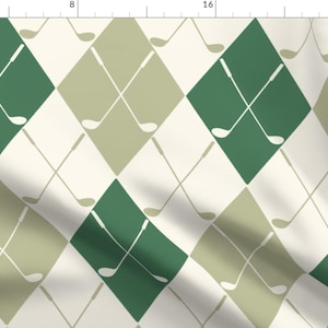 May include: A seamless pattern featuring a repeating design of crossed golf clubs on a diamond-shaped background. The diamonds alternate between green and beige on a cream background.