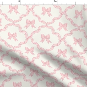 May include: A seamless pattern featuring pink bows on a cream background. The bows are arranged in a repeating pattern of overlapping loops, creating a delicate and feminine design.