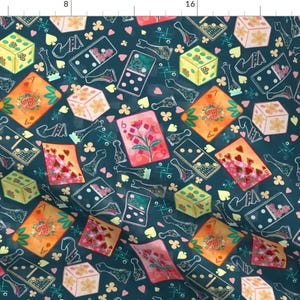 May include: A teal fabric pattern featuring playing cards, dice, dominoes, and chess pieces. The cards display floral designs and suit symbols. The dice are yellow with floral accents. Dominoes and chess pieces are outlined in white.