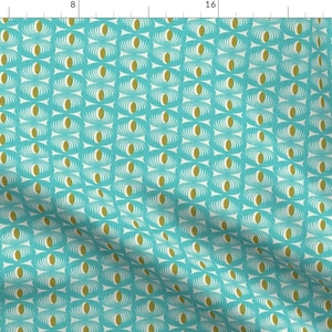 May include: A repeating pattern of teal, white, and gold oval shapes. The design is a repeating pattern of oval shapes with a white, fan-like design on the outside and a gold oval in the center. The background is a solid teal color.