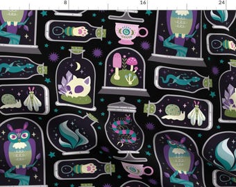 May include: A black and white fabric design featuring various whimsical creatures and objects inside glass jars. The design includes owls, butterflies, snails, mushrooms, and crystals. The jars are surrounded by stars and other decorative elements.