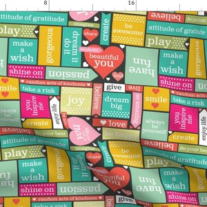 May include: A black background with colorful squares and hearts featuring positive words and phrases like "play", "make a wish", "shine on", "attitude of gratitude", "dream big", "believe", "joy", "inspire", "create", "do your best", "give", "love", "be happy", "always be yourself", "so amazing", "beautiful you", "random acts of kindness", "take a risk", "enjoy life", "gorgeous", "unleash", "passion", "you are enough", "imagine", "share", "create", "be awesome", "smile", "unleash", "passion", "you are enough", "imagine", "share", "create", "be awesome", "smile".