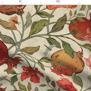 May include: A fabric pattern featuring red and golden pomegranates, green leaves, and orange flowers on a beige background. The design includes small insects like dragonflies and butterflies interspersed among the botanical elements.