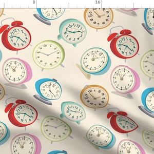 May include: A seamless pattern featuring various colorful alarm clocks with Roman numeral faces. The clocks are in shades of blue, green, red, pink, and yellow, and are set against a cream background.