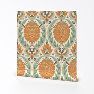 May include: A seamless pattern featuring a repeating design of orange, teal and grey floral motifs on a white background. The pattern is reminiscent of traditional Islamic art.