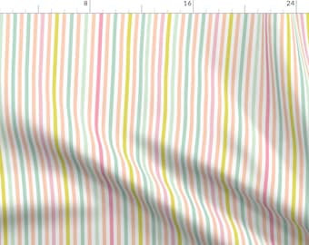 May include: A white fabric with vertical stripes in pastel pink, light green, and yellow.