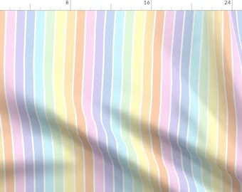 May include: A fabric featuring a repeating vertical stripe pattern in soft pastel colors including light pink, pale yellow, mint green, lavender, and baby blue, separated by thin white lines, with a ruler visible along the top and left edges.