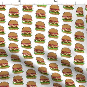 May include: A white background with a repeating pattern of cartoon hamburgers. Each hamburger has a brown bun, a red patty, yellow cheese, green lettuce, and white sesame seeds.