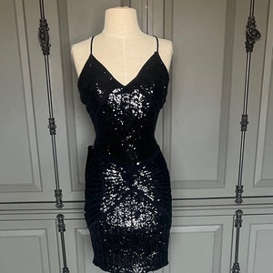 stretchy sexy sequin minidress by Bebe Size 4/6