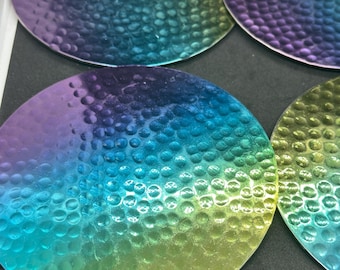 Set of 4 Thirstystone rainbow coasters made from hammered stainless steel
