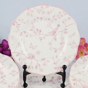 May include: A rustic wooden sign with the text "Welcome to our home" in white lettering. The sign features a distressed finish and a simple, inviting design, perfect for entryway decor.