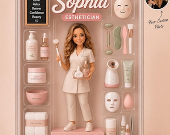 May include: A doll set in a clear display box featuring a doll dressed as an esthetician, surrounded by miniature skincare accessories including a cleanser, serum, moisturizer, mask bowl, towels, facial roller, steamer, clay mask, and cotton pads.