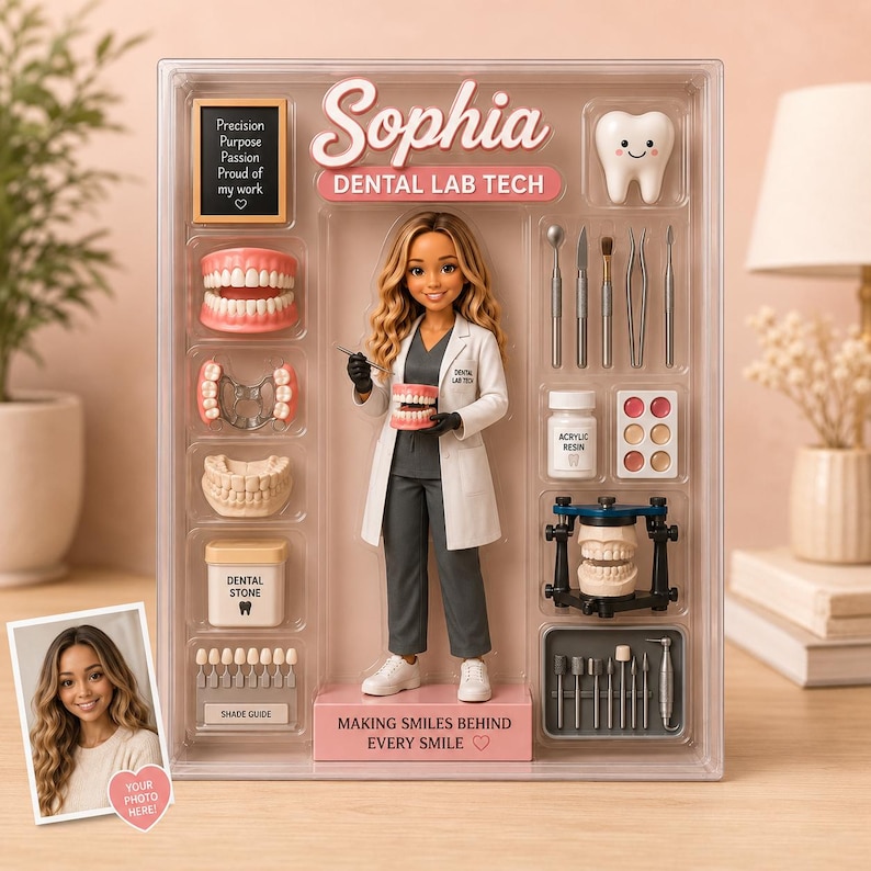 May include: A doll set featuring a dental lab technician in a white coat and gray scrubs, packaged in a clear display box. Accessories include dental tools, a shade guide, acrylic resin, a dental articulator, and a sign reading Sophia Dental Lab Tech.