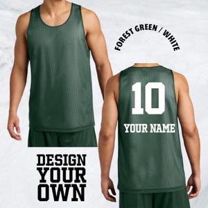 May include: Forest green reversible basketball jersey with white lettering. The front of the jersey is plain, while the back features the number 10 and the words "YOUR NAME". The text "DESIGN YOUR OWN" is also visible.