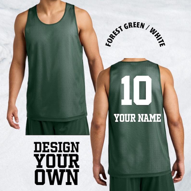 May include: Forest green reversible basketball jersey with white lettering. The front of the jersey is plain, while the back features the number 10 and the words "YOUR NAME". The text "DESIGN YOUR OWN" is also visible.