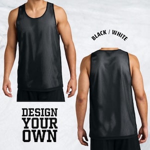 May include: Black reversible mesh tank top. The tank top is shown from the front and back. The text "BLACK / WHITE" is above the back view of the tank top. The text "DESIGN YOUR OWN" is below the front view of the tank top.