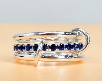 Anello in argento sterling con più maglie e pietre preziose, fascia intrecciata